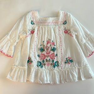 Embroidered bell sleeve top